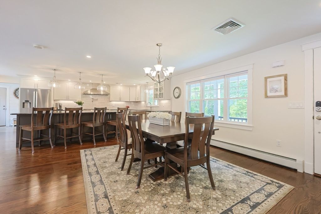 Chandelier, Dining room, Interior, Kitchen, Pendant Lights, Recessed Lighting, Stainless Steel Appliances, Wood Texture Flooring