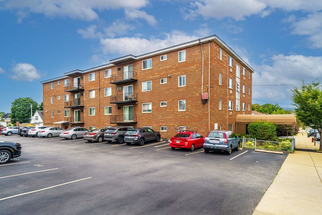 Exterior, Facade, Brick Facade, Condo Building