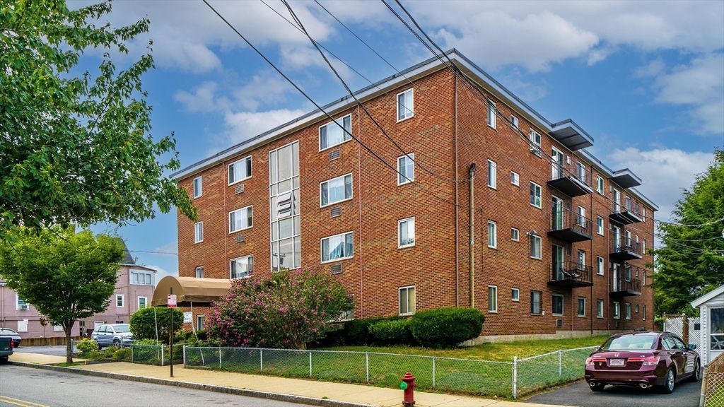 Exterior, Facade, Brick Facade, Condo Building