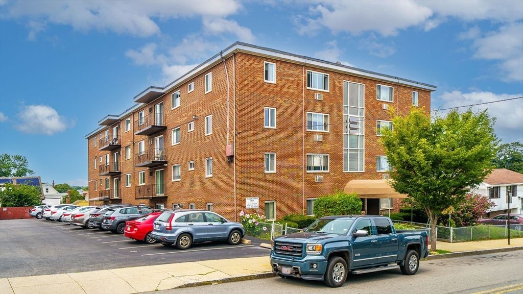 Exterior, Facade, Brick Facade, Condo Building