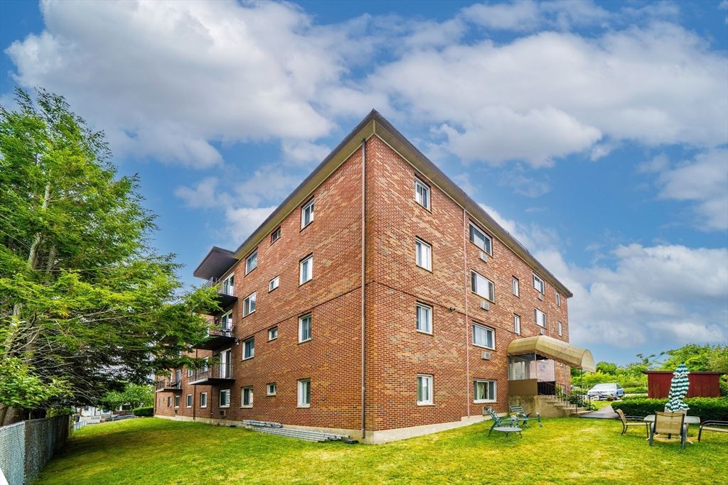 Backyard, Exterior, Facade, Brick Facade, Condo Building