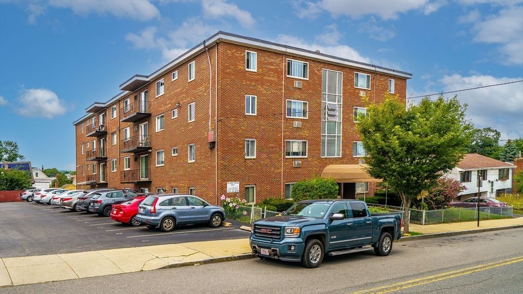 Exterior, Facade, Brick Facade, Condo Building