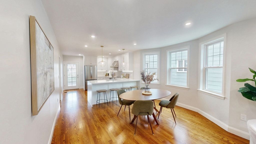 Dining room, Interior, Kitchen, Pendant Lights, Recessed Lighting, Stainless Steel Appliances, Wood Texture Flooring