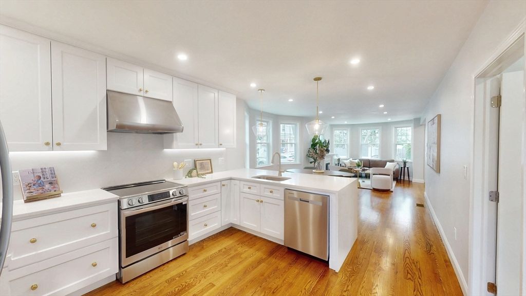 Dining room, Interior, Kitchen, Living room, Pendant Lights, Recessed Lighting, Stainless Steel Appliances, Wood Texture Flooring