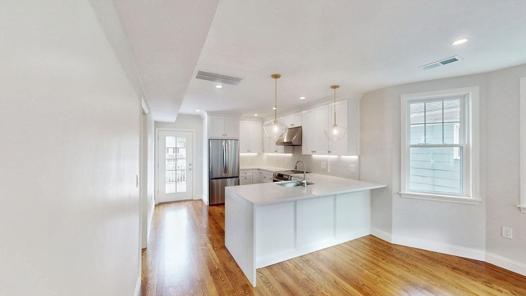 Interior, Kitchen, Pendant Lights, Recessed Lighting, Stainless Steel Appliances, Wood Texture Flooring