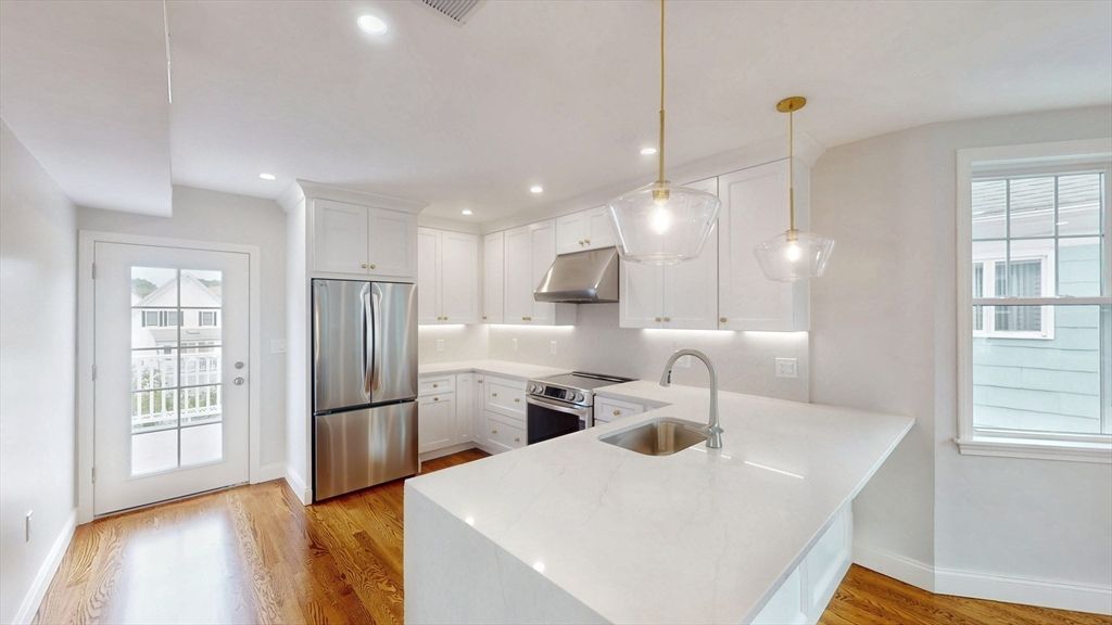 Interior, Kitchen, Pendant Lights, Recessed Lighting, Stainless Steel Appliances, Wood Texture Flooring