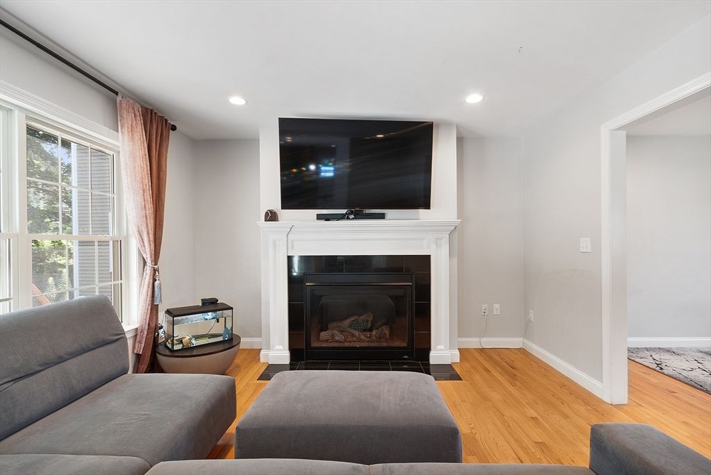 Fireplace, Interior, Living room, Recessed Lighting, Wood Texture Flooring