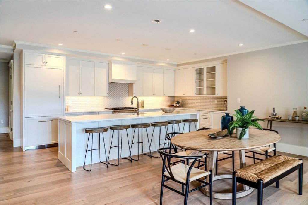 Dining room, Interior, Kitchen, Recessed Lighting, Stainless Steel Appliances, Wood Texture Flooring