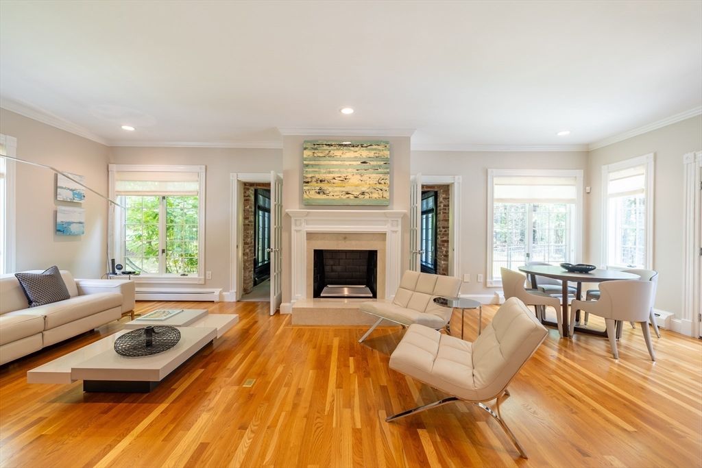Dining room, Fireplace, Interior, Living room, Recessed Lighting, Wood Texture Flooring