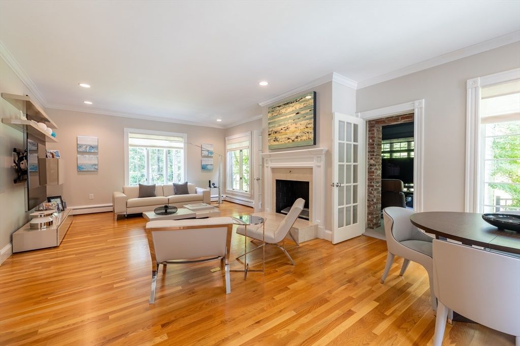 Dining room, Fireplace, Interior, Living room, Recessed Lighting, Wood Texture Flooring