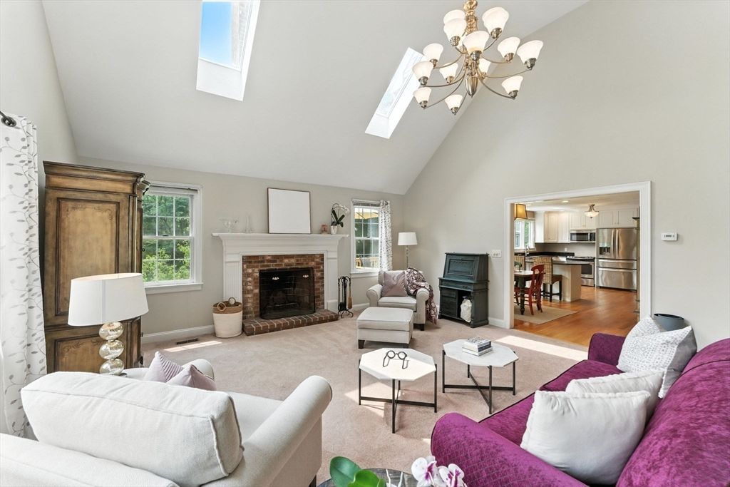Chandelier, Fireplace, Interior, Kitchen, Living room, Stainless Steel Appliances, Wood Texture Flooring