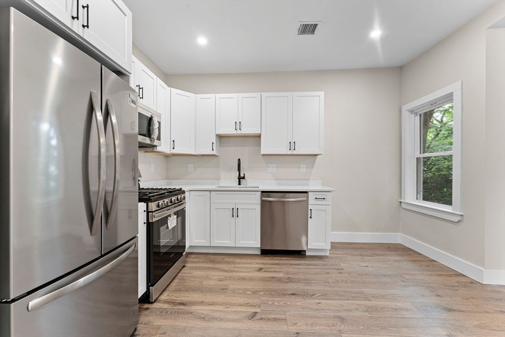 Interior, Kitchen, Recessed Lighting, Stainless Steel Appliances, Wood Texture Flooring