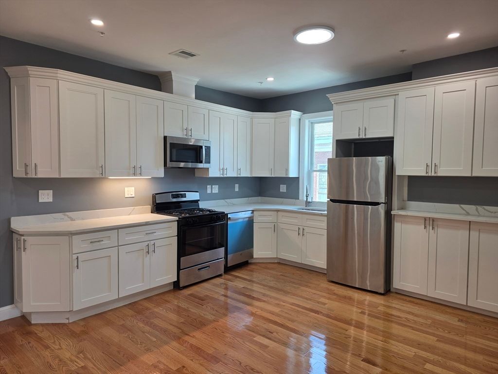 Interior, Kitchen, Recessed Lighting, Stainless Steel Appliances, Wood Texture Flooring