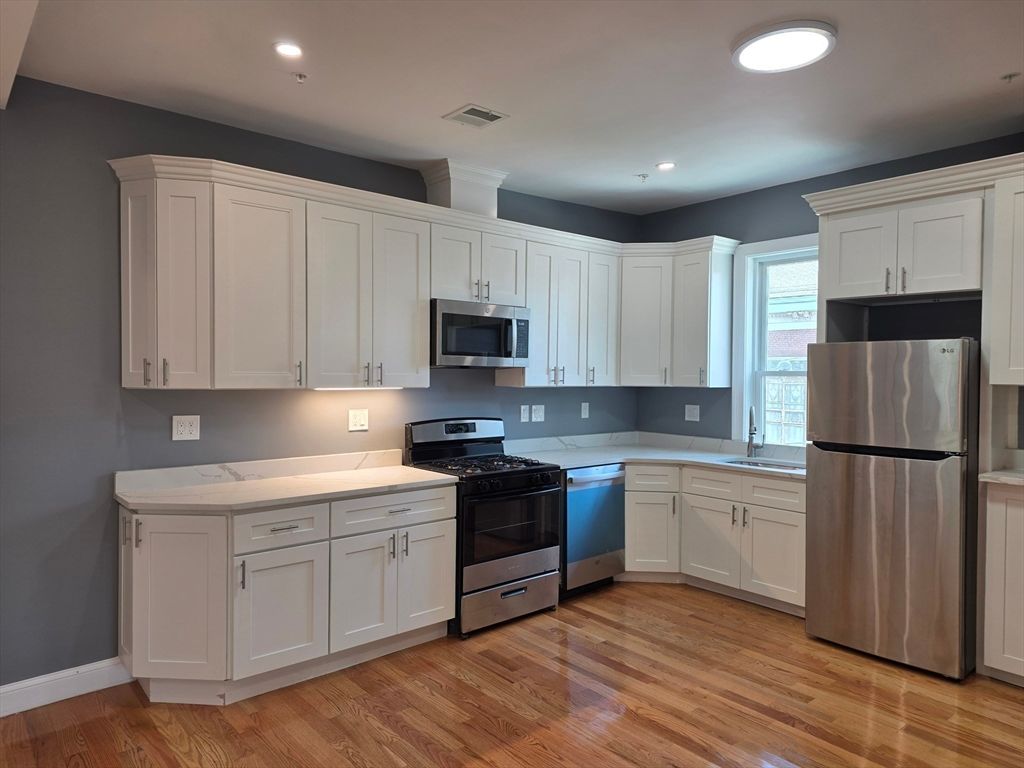 Interior, Kitchen, Recessed Lighting, Stainless Steel Appliances, Wood Texture Flooring