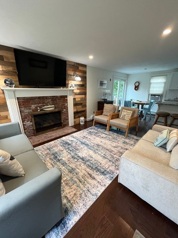 Dining room, Fireplace, Interior, Living room, Recessed Lighting, Wood Texture Flooring, Wooden Walls