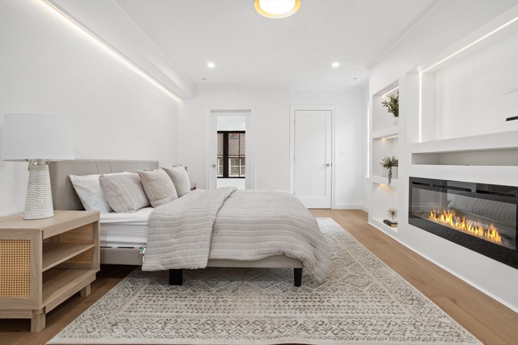 Bedroom, Fireplace, Interior, Recessed Lighting, Wood Texture Flooring