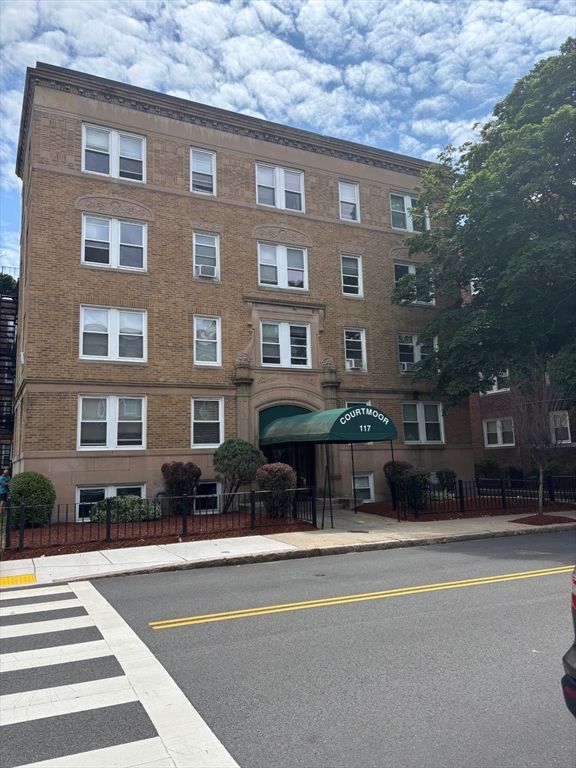 Exterior, Facade, Brick Facade, Condo Building