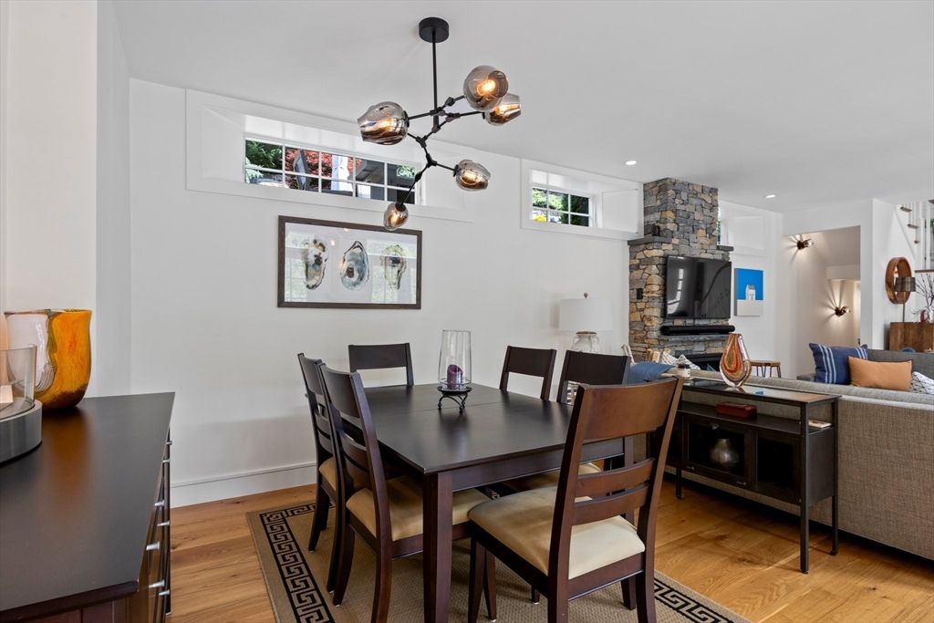 Dining room, Fireplace, Interior, Living room, Pendant Lights, Recessed Lighting, Stone Walls, Wood Texture Flooring