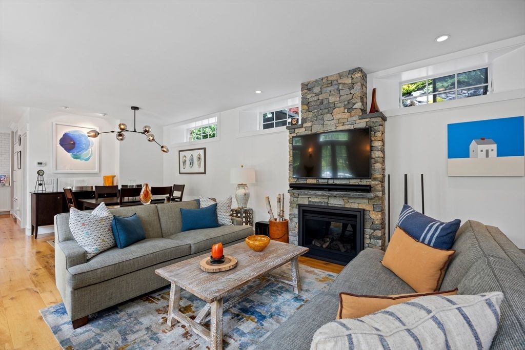 Dining room, Fireplace, Interior, Living room, Pendant Lights, Recessed Lighting, Stone Walls, Wood Texture Flooring