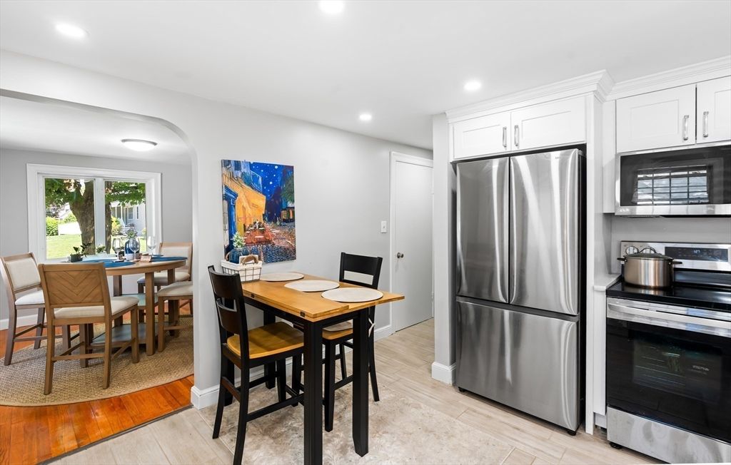 Dining room, Interior, Kitchen, Recessed Lighting, Stainless Steel Appliances, Wood Texture Flooring