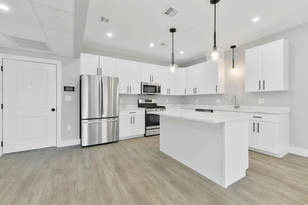 Interior, Kitchen, Pendant Lights, Recessed Lighting, Stainless Steel Appliances, Wood Texture Flooring