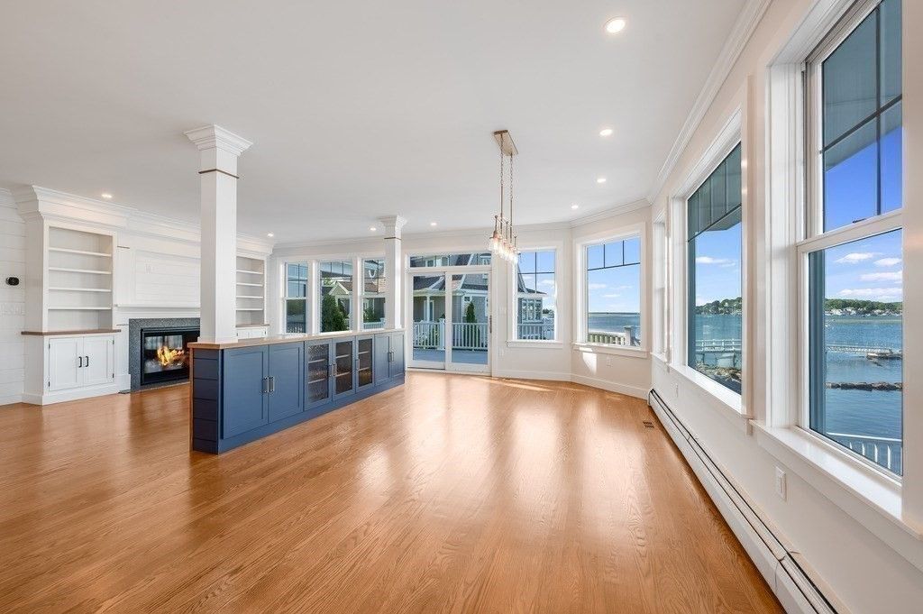 Empty room, Fireplace, Interior, Pendant Lights, Recessed Lighting, Water, Wood Texture Flooring