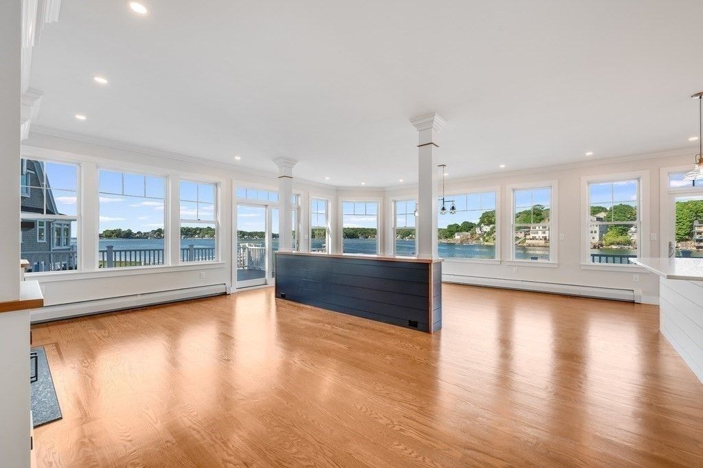 Empty room, Fireplace, Interior, Pendant Lights, Recessed Lighting, Water, Wood Texture Flooring