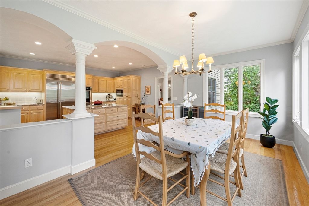 Chandelier, Dining room, Interior, Kitchen, Recessed Lighting, Stainless Steel Appliances, Wood Texture Flooring