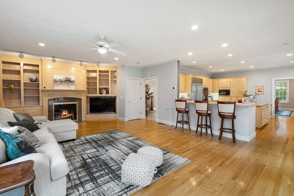 Fireplace, Interior, Kitchen, Living room, Recessed Lighting, Stainless Steel Appliances, Wood Texture Flooring
