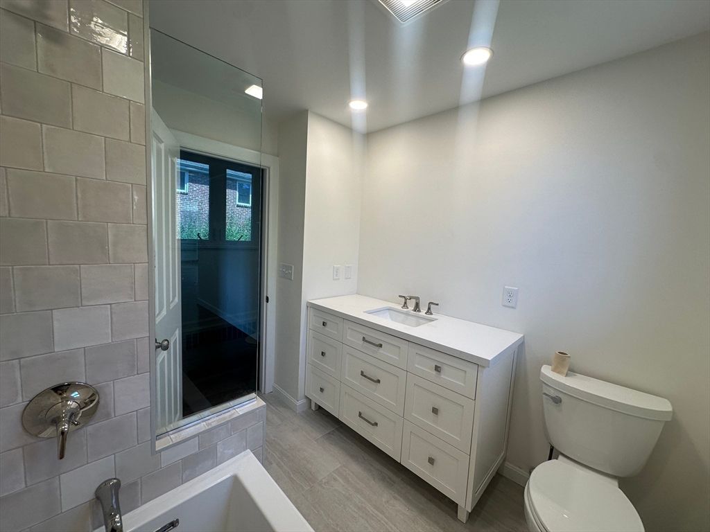 Bathroom, Dual Sink Vanities, Interior, Recessed Lighting, Wood Texture Flooring