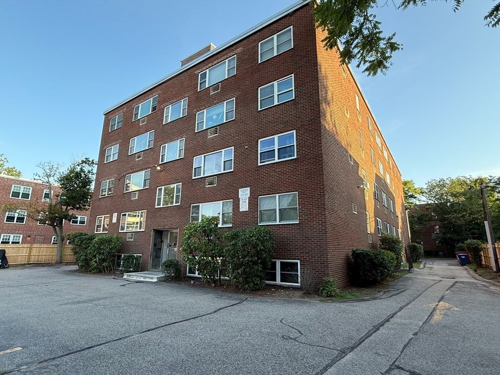 Exterior, Facade, Brick Facade, Condo Building