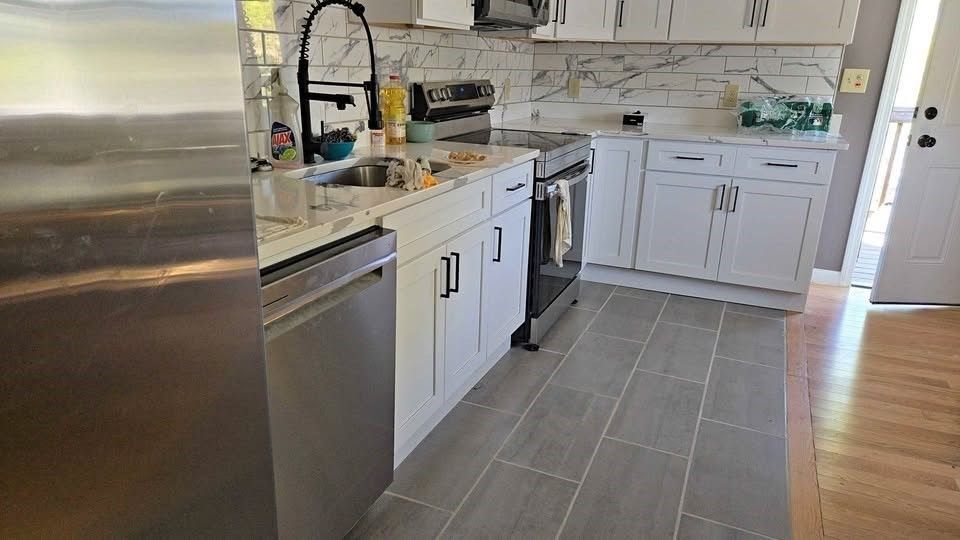 Interior, Kitchen, Marble Walls, Stainless Steel Appliances, Wood Texture Flooring