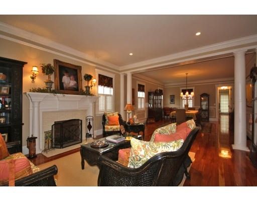Chandelier, Dining room, Fireplace, Interior, Living room, Recessed Lighting, Wood Texture Flooring