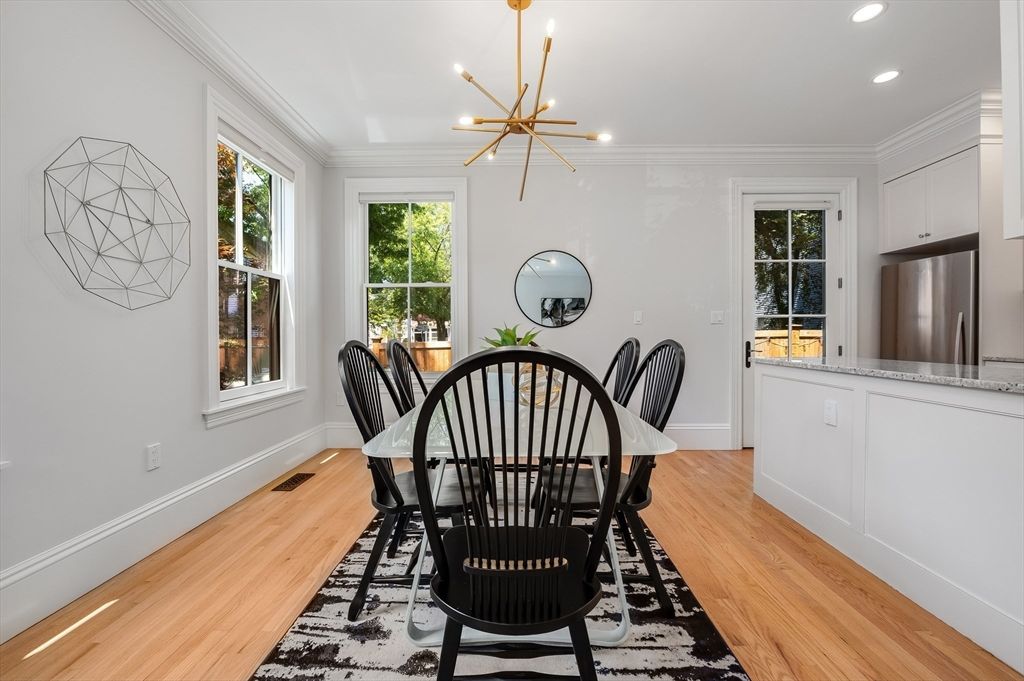 Dining room, Interior, Kitchen, Pendant Lights, Recessed Lighting, Stainless Steel Appliances, Wood Texture Flooring