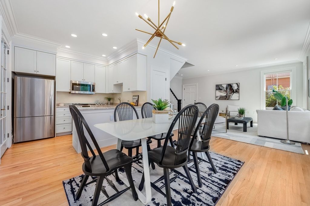 Dining room, Interior, Kitchen, Pendant Lights, Recessed Lighting, Stainless Steel Appliances, Wood Texture Flooring