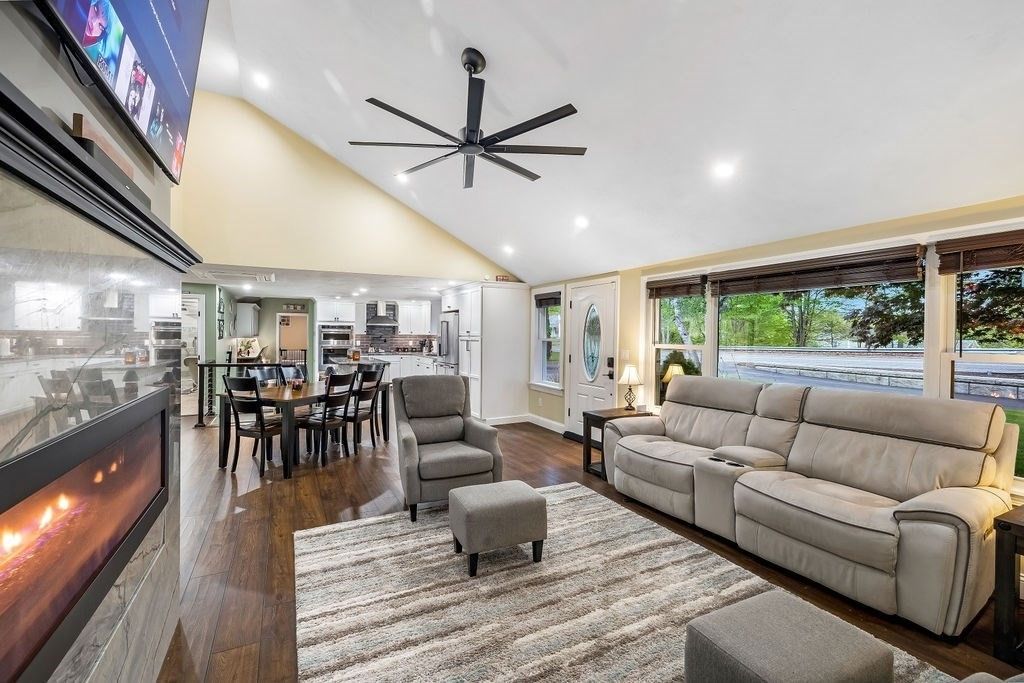 Dining room, Fireplace, Interior, Living room, Recessed Lighting, Wood Texture Flooring