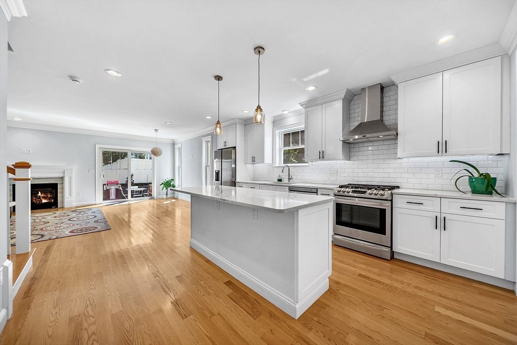 Fireplace, Interior, Kitchen, Pendant Lights, Recessed Lighting, Stainless Steel Appliances, Wood Texture Flooring