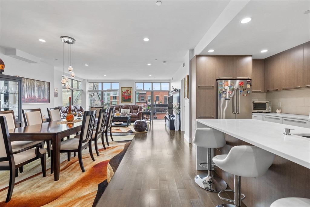 Dining room, Interior, Kitchen, Living room, Pendant Lights, Recessed Lighting, Stainless Steel Appliances, Wood Texture Flooring