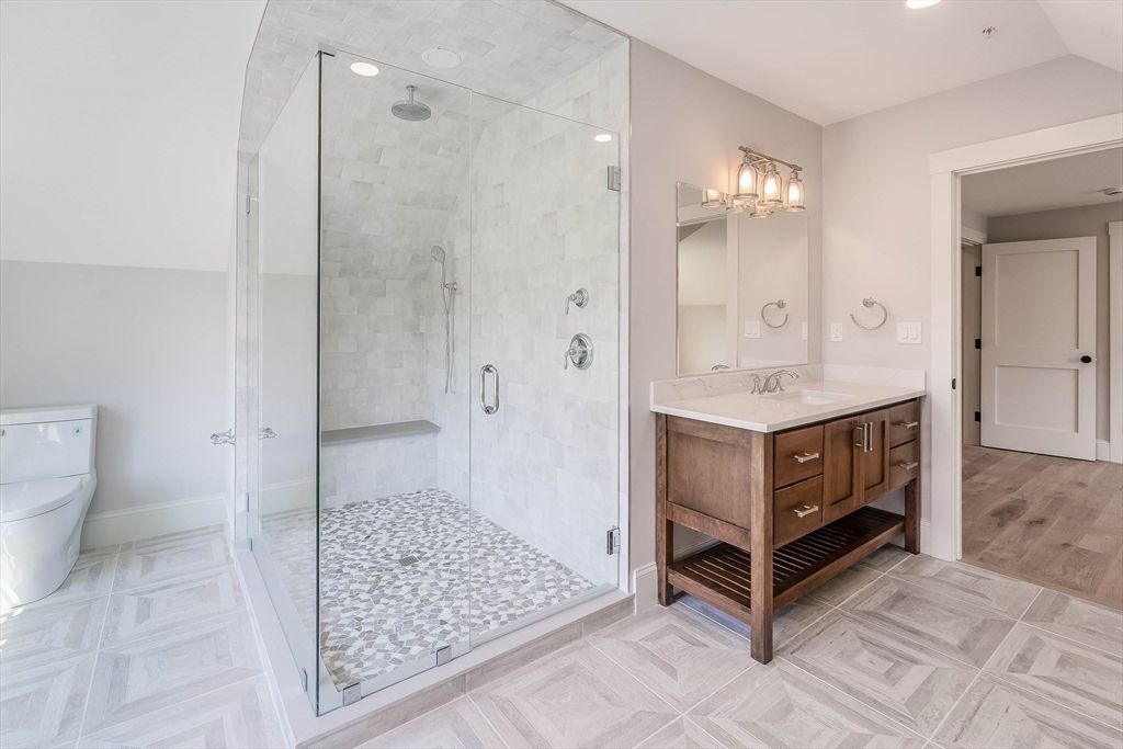 Bathroom, Dual Sink Vanities, Glass Shower, Interior, Recessed Lighting, Wood Texture Flooring