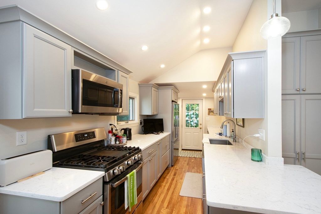 Interior, Kitchen, Pendant Lights, Recessed Lighting, Stainless Steel Appliances, Wood Texture Flooring