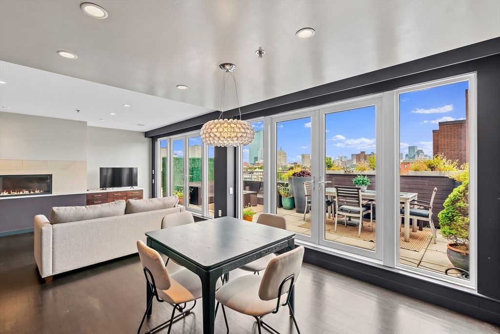 Dining room, Fireplace, Interior, Living room, Pendant Lights, Recessed Lighting, Wood Texture Flooring