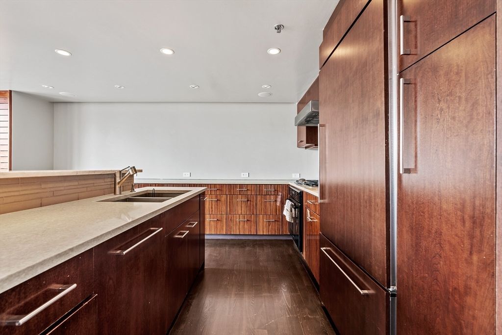 Interior, Kitchen, Recessed Lighting, Washer, Wood Texture Flooring