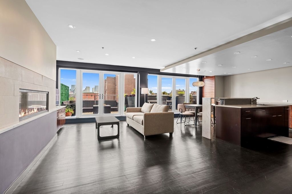 Dining room, Fireplace, Interior, Living room, Pendant Lights, Recessed Lighting, Wood Texture Flooring