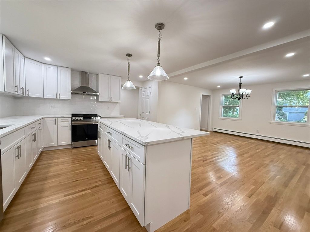 Chandelier, Interior, Kitchen, Pendant Lights, Recessed Lighting, Stainless Steel Appliances, Wood Texture Flooring