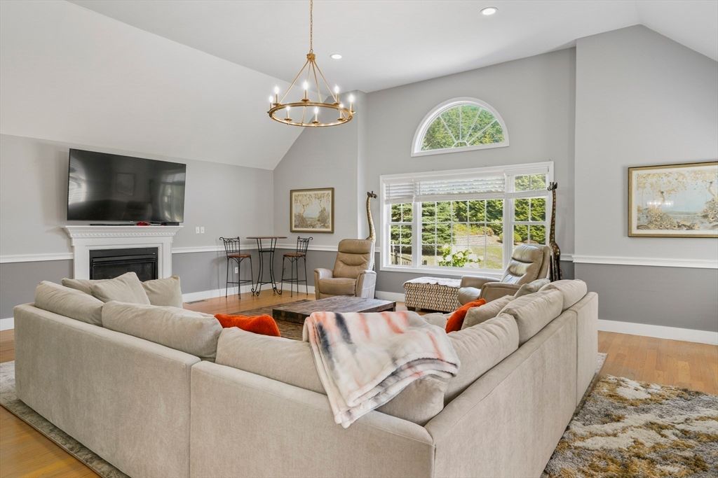 Chandelier, Fireplace, Interior, Living room, Pendant Lights, Recessed Lighting, Wood Texture Flooring