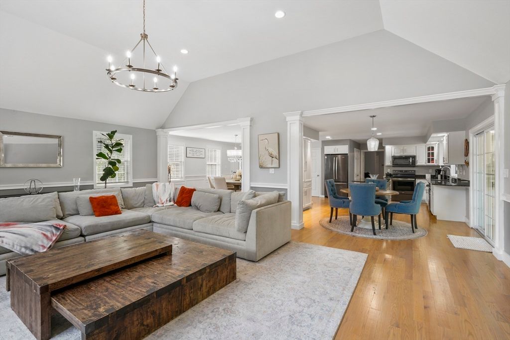 Chandelier, Dining room, Interior, Kitchen, Living room, Pendant Lights, Recessed Lighting, Stainless Steel Appliances, Wood Texture Flooring