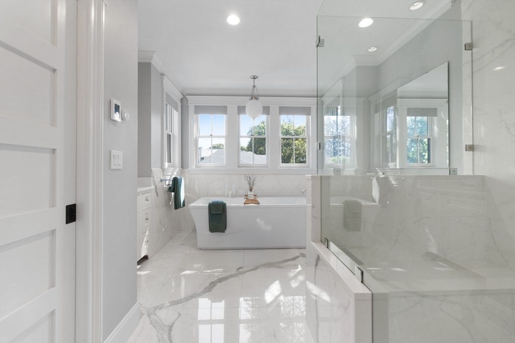 Bathroom, Free Standing Baths, Glass Shower, Interior, Marble, Marble Walls, Pendant Lights, Recessed Lighting