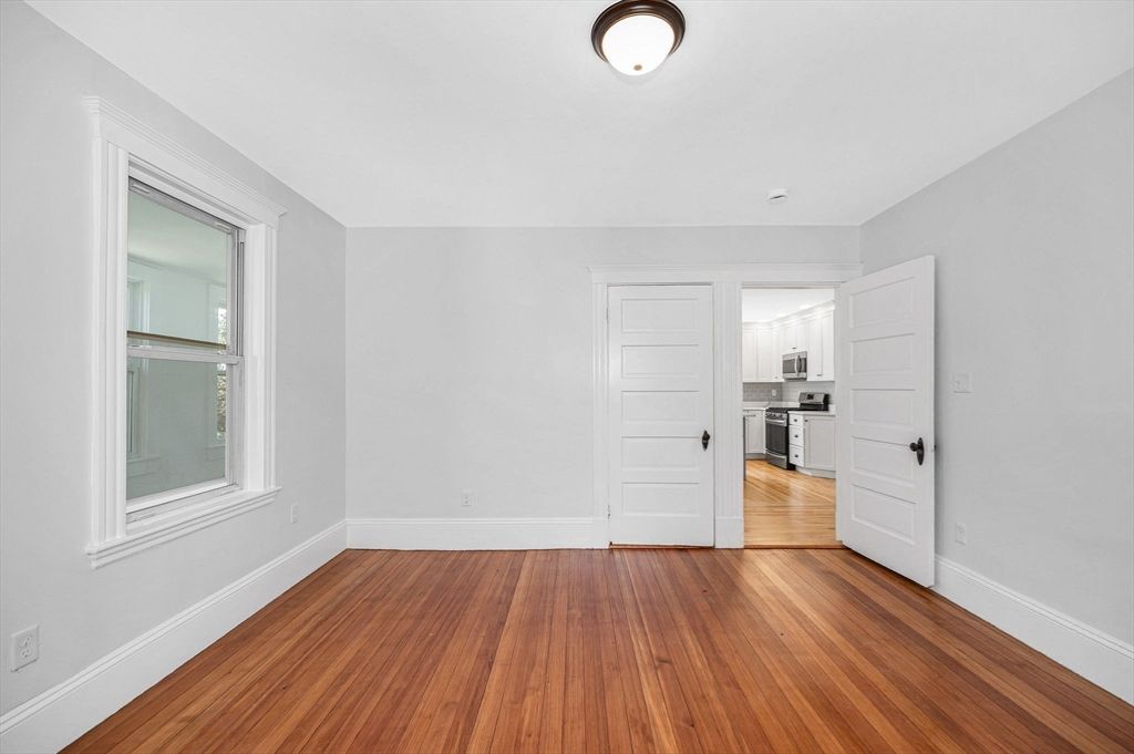 Empty room, Interior, Kitchen, Stainless Steel Appliances, Wood Texture Flooring
