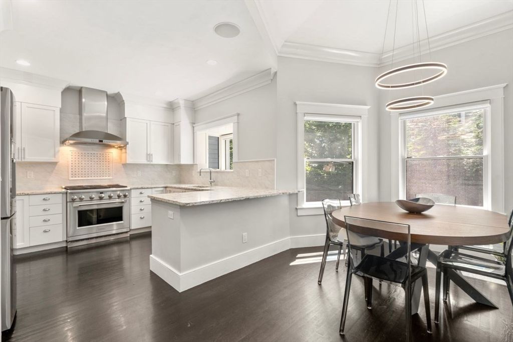 Dining room, Interior, Kitchen, Pendant Lights, Recessed Lighting, Stainless Steel Appliances, Wood Texture Flooring
