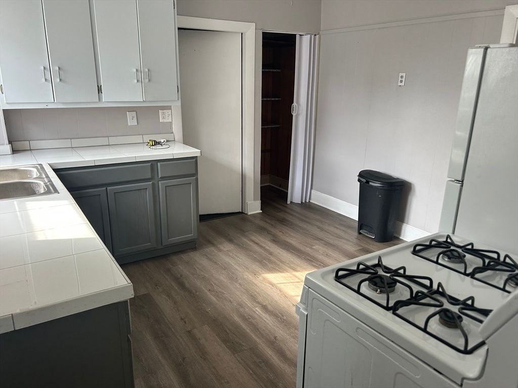 Interior, Kitchen, Tile Countertops, Wood Texture Flooring